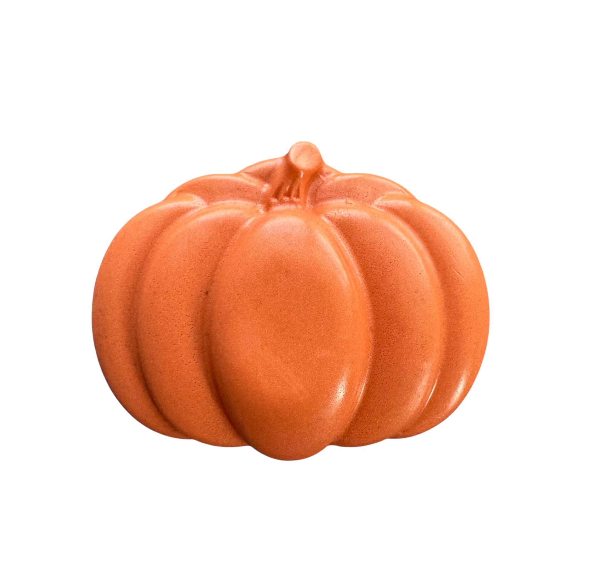 Orange ceramic pumpkin on a white background
