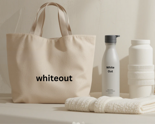 Beige tote bag, white water bottle, and towel on a light background
