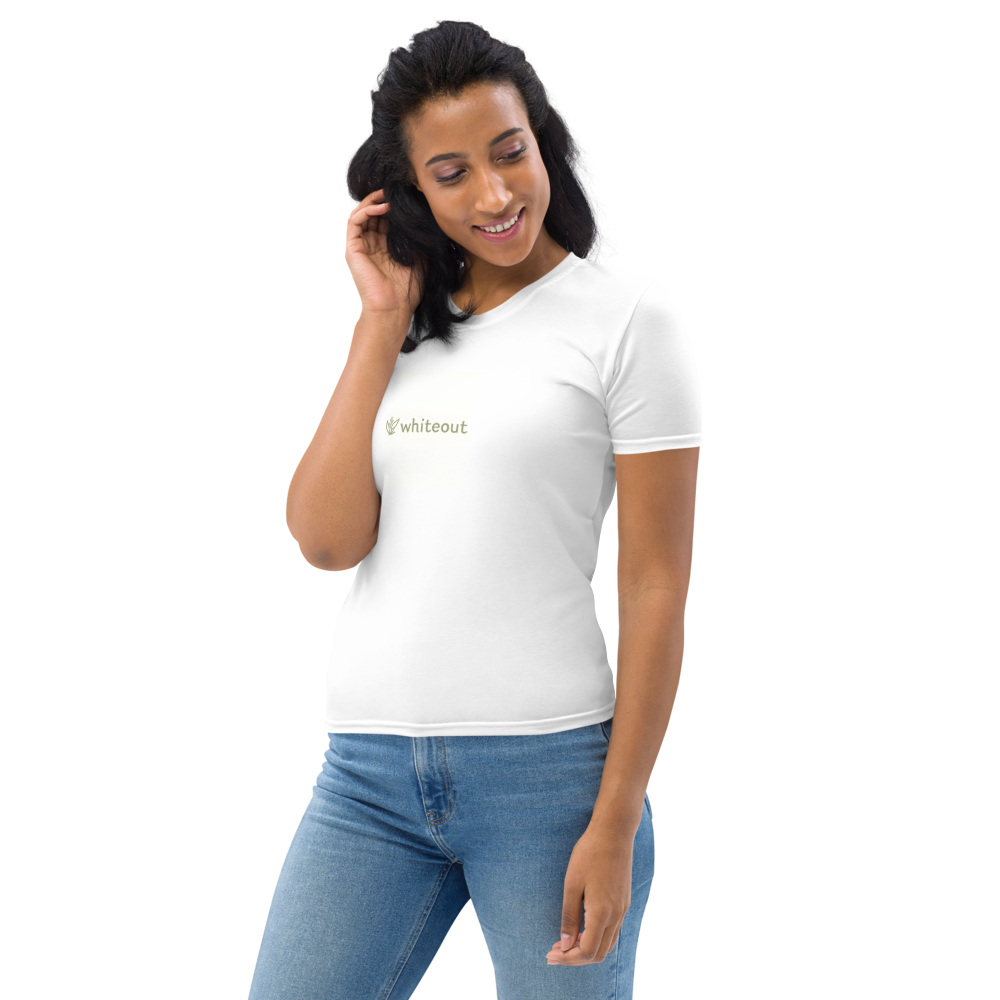 Woman wearing a white t-shirt with 'Whiteout' logo on a white background