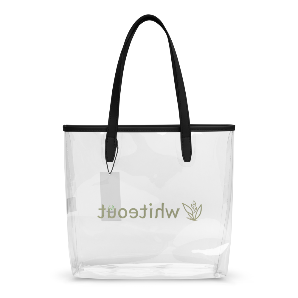 Clear tote bag with black handles and a visible brand tag on a white background