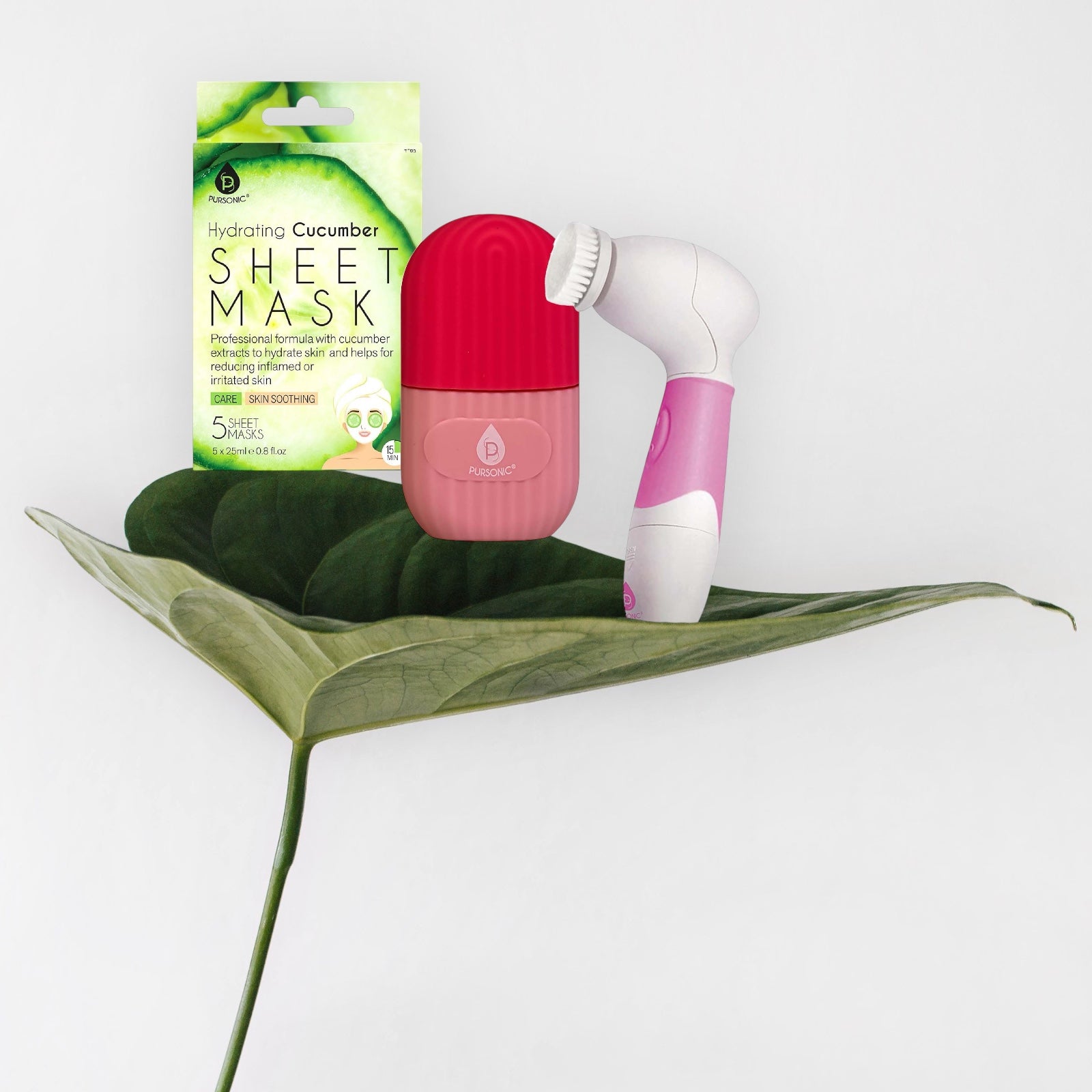 Sheet mask packaging, pink and white device on a leaf with a white background