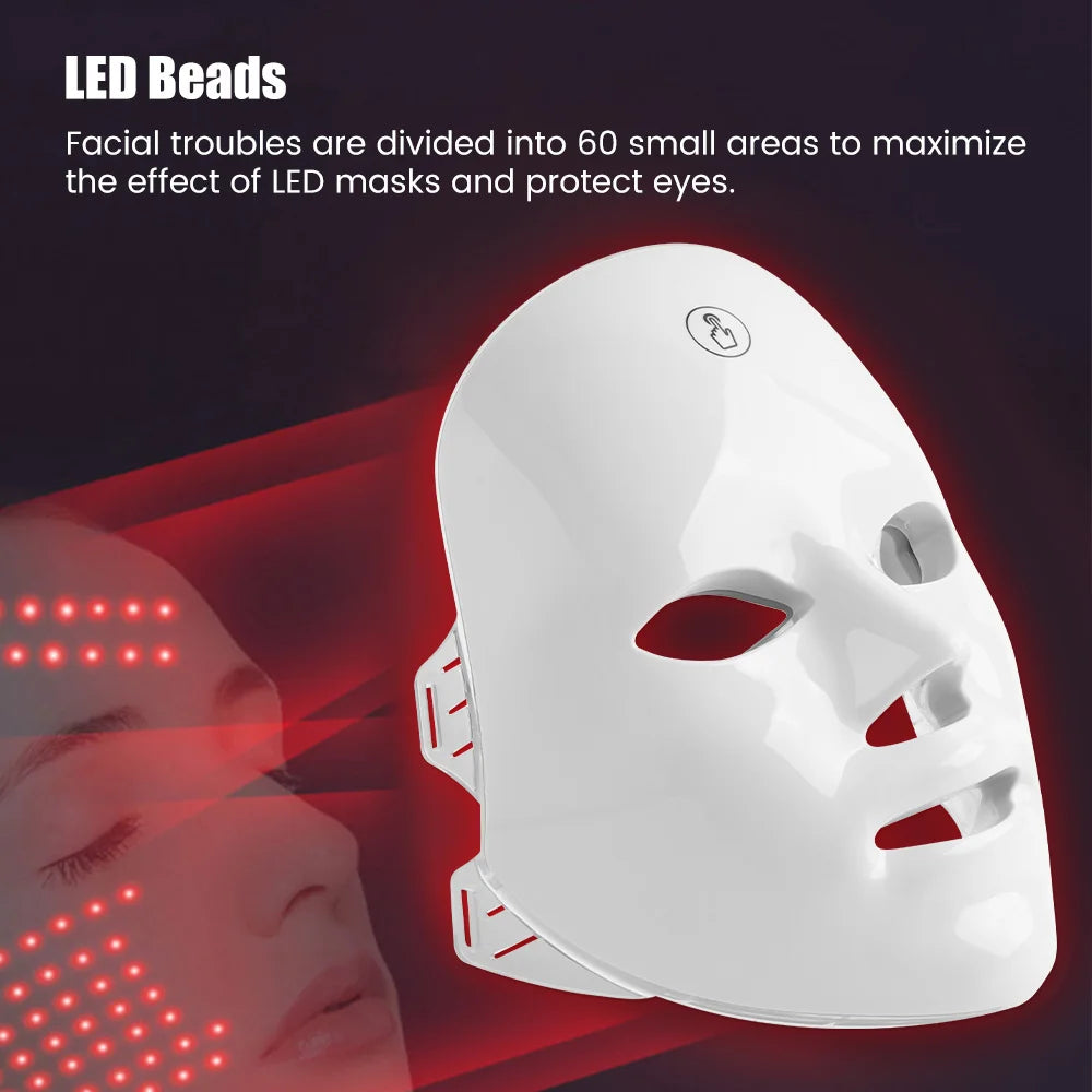 White LED face mask with red lights on a dark background