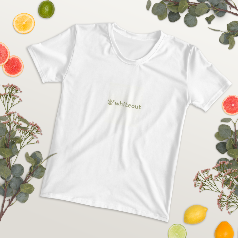 White t-shirt with 'whitout' logo on a light background with fruits and plants.