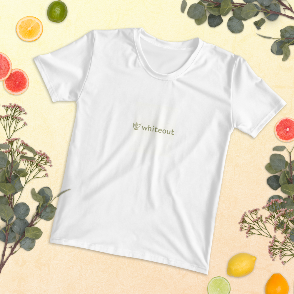 White t-shirt with 'whiteout' logo on a yellow background with fruits and plants.