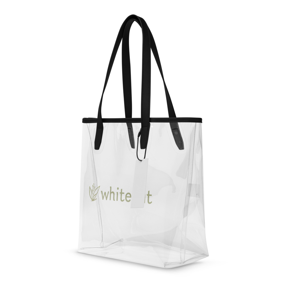 Clear tote bag with black handles and 'White Out' branding on a white background