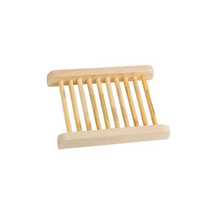 Wooden soap dish on a white background