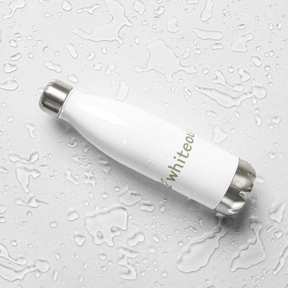 White water bottle with 'Whitee' branding on a textured gray surface
