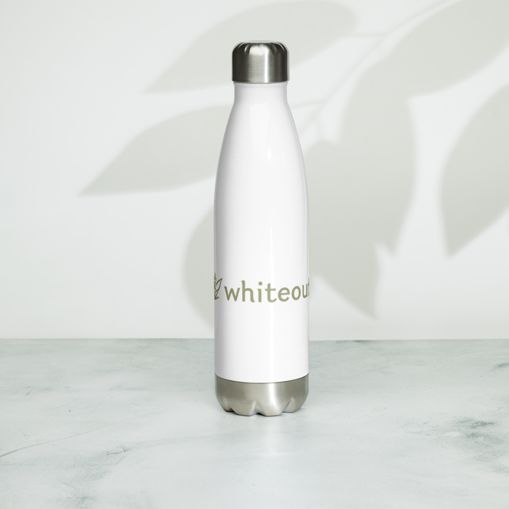 White insulated bottle with silver lid on a marble surface
